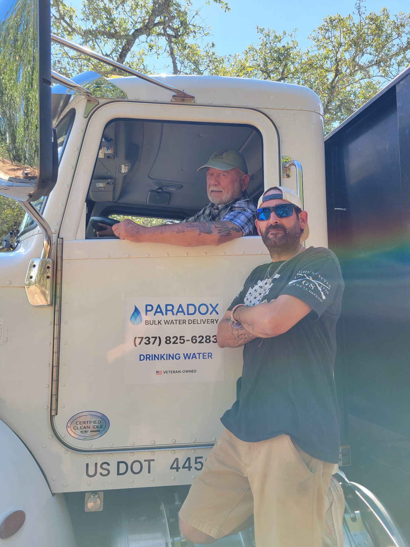 Paradox Water Delivery founders with truck